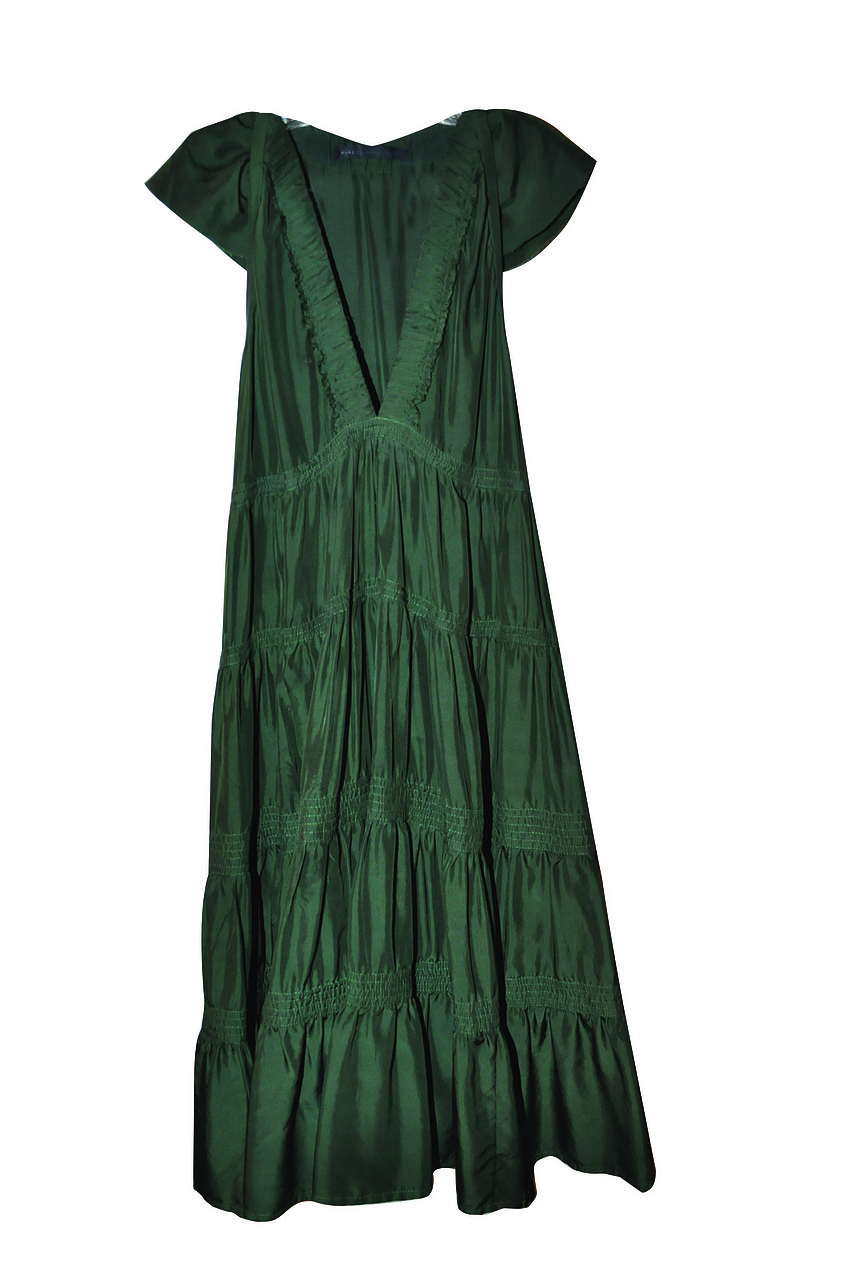 MARC JACOBS
<br><br>
â€œThe sisterhood of the traveling dress. It looks good on me, my mom, and my sister, Jaymie. Itâ€™s a very flattering color. There needs to be more forest green.â€