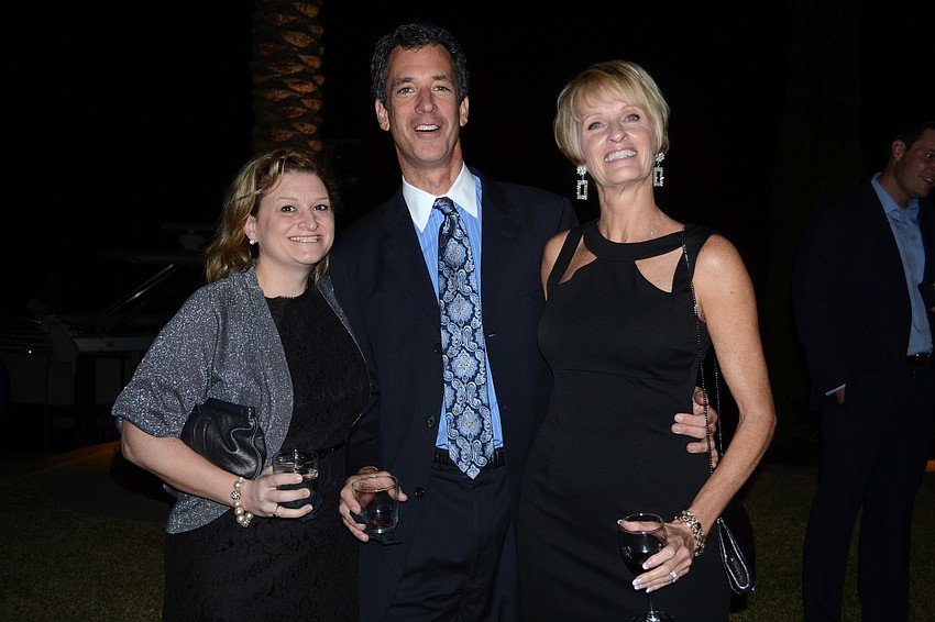 Tricia Mire with Scott and Candy Greer