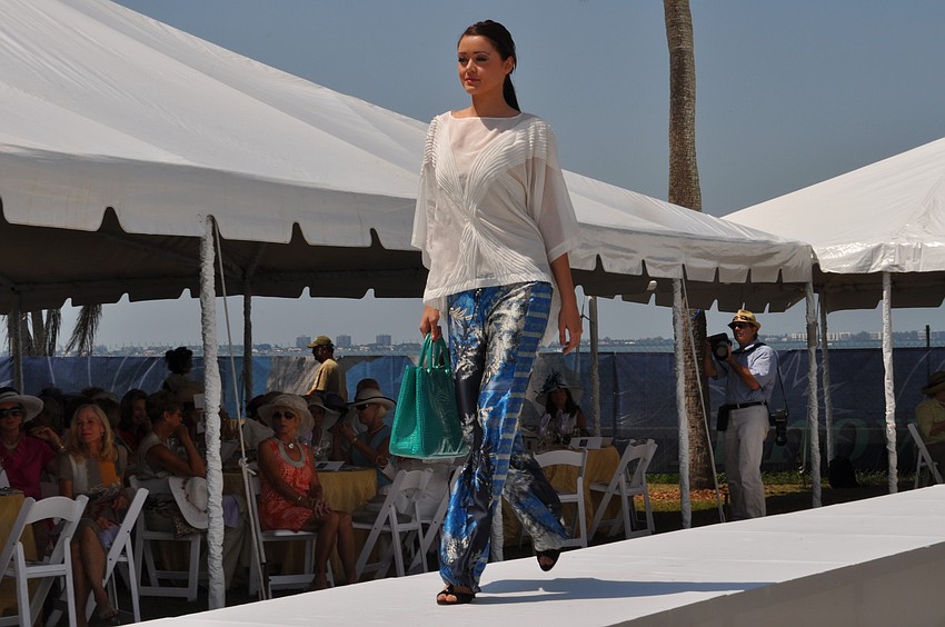 Models strutted the runway in Saks Fifth Avenue fashions.
