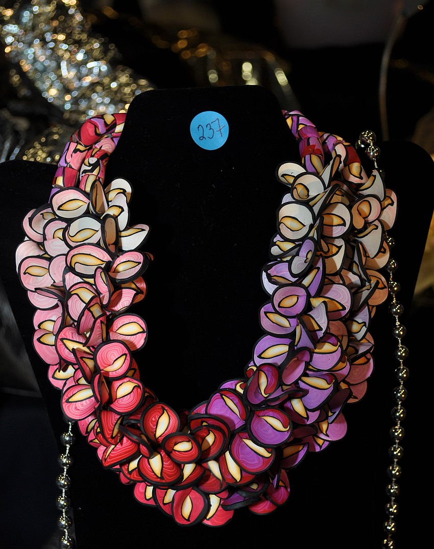 This hand-molded clay necklace was up for auction.