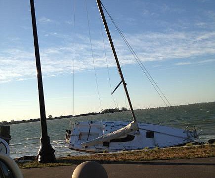 Heavy winds swept the area on Sunday, March 4, but eventually blew over â€” but not before blowing this boat into Bird Key Park.