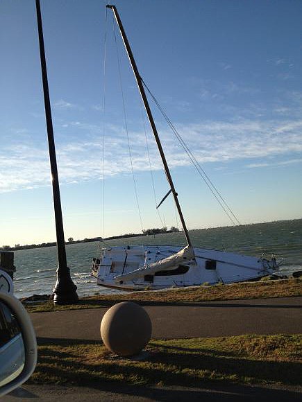 Heavy winds swept the area on Sunday, March 4, but eventually blew over â€” but not before blowing this boat into Bird Key Park.
