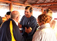 Dave Sparks talked with many groups of people at his goodbye party.