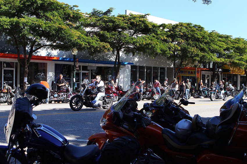 Bikers make their way through downtown Sarasota, Sunday, Jan. 8, during the weekend long event, Thunder by the Bay.