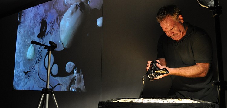 Ken Cro-Ken painted live to oboist Matt Sullivan and live-streamed video footage  for attendees at Longboat Key Center for the Arts, a Division of Ringling College of Art and Design on Friday, Jan. 6.