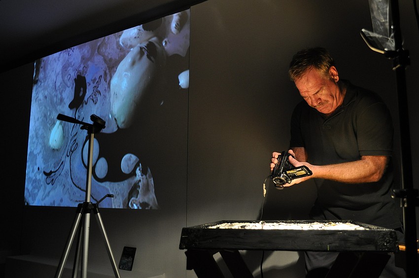 Ken Cro-Ken painted live to oboist Matt Sullivan and live-streamed video footage  for attendees at Longboat Key Center for the Arts, a Division of Ringling College of Art and Design on Friday, Jan. 6.