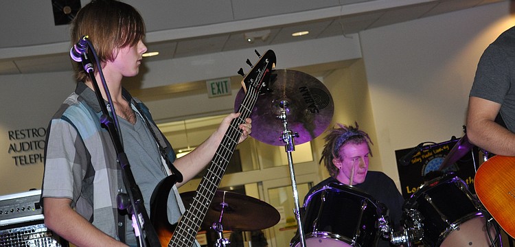 Mark Gunnerson and Nick Vonknorring of UnEven LaNes perform at the Selby Public Library.