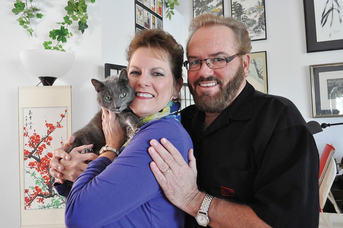 "When (opera is) done right, it touches a part of your soul you didnÃ¢â‚¬â„¢t know was there Ã¢â‚¬â€ just like animals do, actually," said opera singer Randy Locke, right, pictured with his wife, Carol Sparrow, and their cat, Boca.