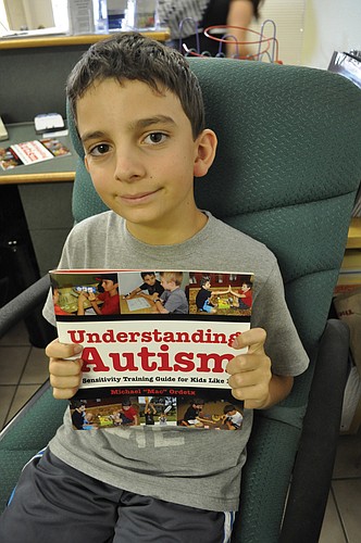 Michael "Mac" Ordetx said he decided to write a book on working with children with autism about two years ago, after being encouraged to do so by individuals who attended his conference presentations on the topic.