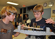 Technology students Stephen Husbands and Holden Scarbrough demonstrated how to make and test a balsa wood bridge.