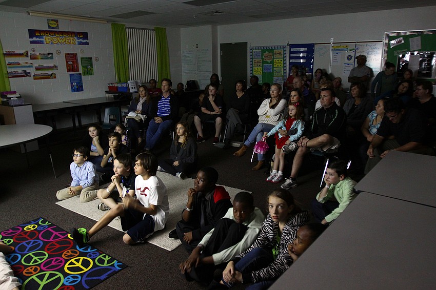 Students, parents and family members watch some of the documentaries made by the 5th graders, Thursday, Jan. 12, during the 5th grade Documentary Film Fest at Phillippi Shore Elementary.