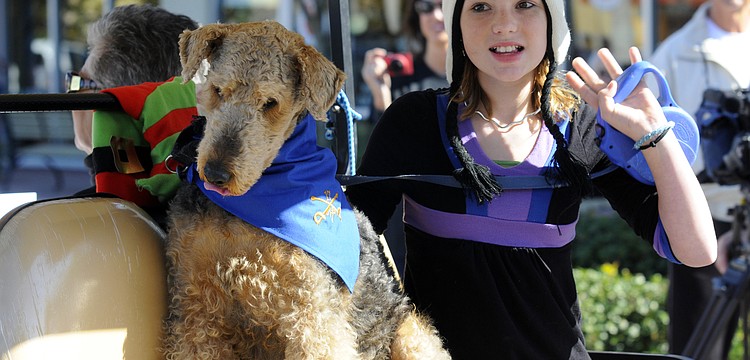 Nine-year-old Canyon Chushman competed in the Leading Man category with her dog Buddy, who came dressed as Gen. George Patton.