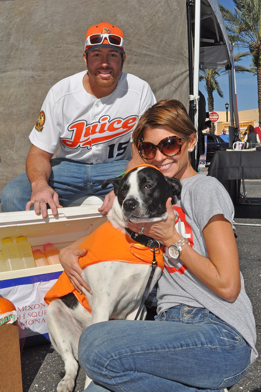 Rick and Gretel Permuy, pictured with their dog Duece, both volunteer at the Humane Society at Lakewood Ranch.