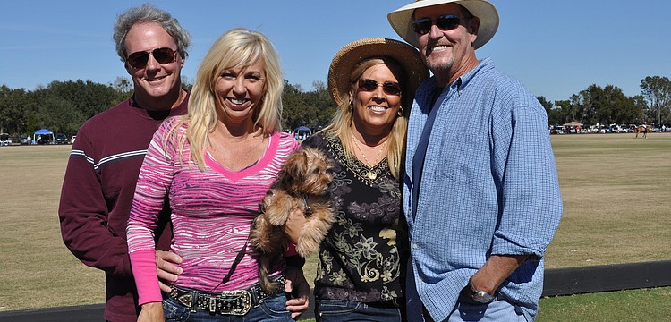 Ed and Wanda Martinetto, along with their dog Gianni, and Gail Boyer and Dave Lacy enjoyed tailgating with the Lakewood Ranch Housewives.