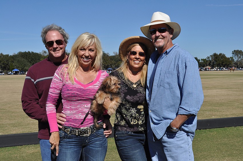 Ed and Wanda Martinetto, along with their dog Gianni, and Gail Boyer and Dave Lacy enjoyed tailgating with the Lakewood Ranch Housewives.