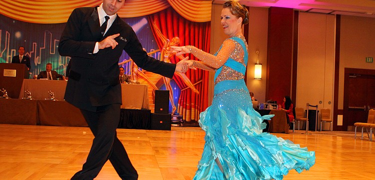 Kiril Arsov and Margy Sivertsen of Sara Dance put on a show during their performance, Sunday, Jan. 15, during the Sarasota Challenge at the Hyatt Regency.