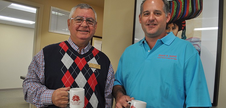 Board Member of St. Armands Circle Assoation Bill Carman and Kurt Hennard with Inland and Island Home Repair and Decorating