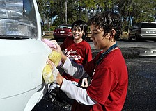 Fifth-graders Dylan Simmons and Anthony Jedrzejewski couldnâ€™t wait to wash the Manatee County Sheriffâ€™s Office vehicle that came through.