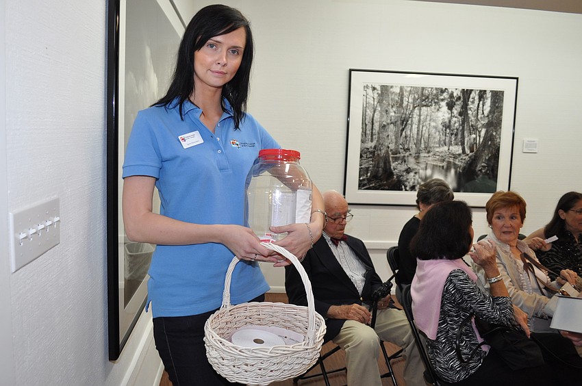 Agneta Ramoskaite sells raffle tickets