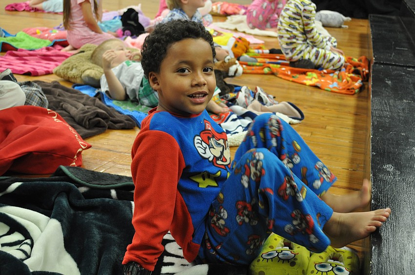 D.J. Rowley gets a close look at the play from the steps of the stage.