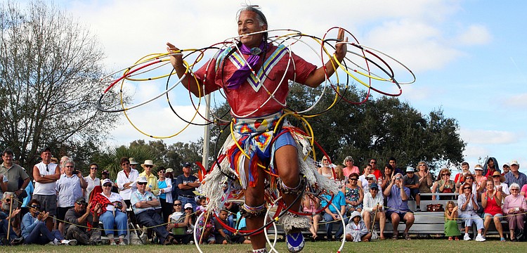 Kevin Loche, professional hoop dancer, shows off his skills, Saturday, Jan. 28, during the Fifth Annual Sarasota Indian Festival at the Sarasota Fairgrounds.