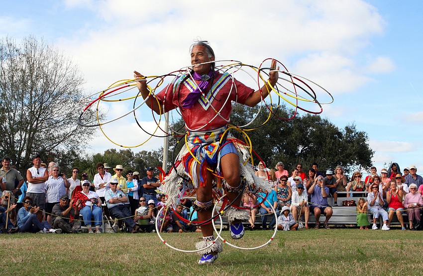 Kevin Loche, professional hoop dancer, shows off his skills, Saturday, Jan. 28, during the Fifth Annual Sarasota Indian Festival at the Sarasota Fairgrounds.