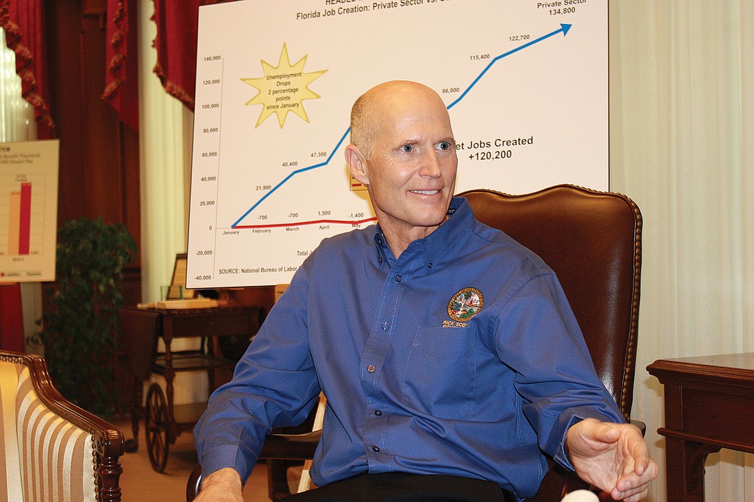 In an exclusive interview with The Observer, Gov. Rick Scott says he is staying true to his core principles and goals of putting the state back to work even as he altars how he handles Tallahassee and the media. Photo by Rod Thomson.