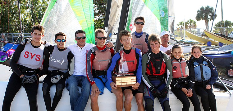 Eric Weinstein, Ravi Parent, Bryan Paine, Jack Famiglietti, Sam Armington, Jason D'Agostino, Brian Firth, Jim Zeller, Sophia Schultz and Jennifer LePatourel pose together with their trophy.