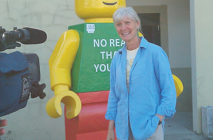 Sarasota Chalk Festival founder Denise Kowal talks with the news media after appearing to pick up Legoman Jan. 26 in Venice. Photo courtesy of the Sarasota County Sheriff's Office