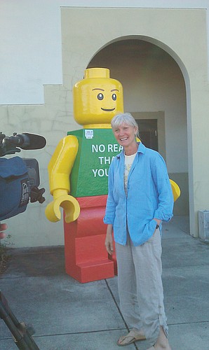 Sarasota Chalk Festival founder Denise Kowal talks with the news media after appearing to pick up Legoman Jan. 26 in Venice. Photo courtesy of the Sarasota County Sheriff's Office