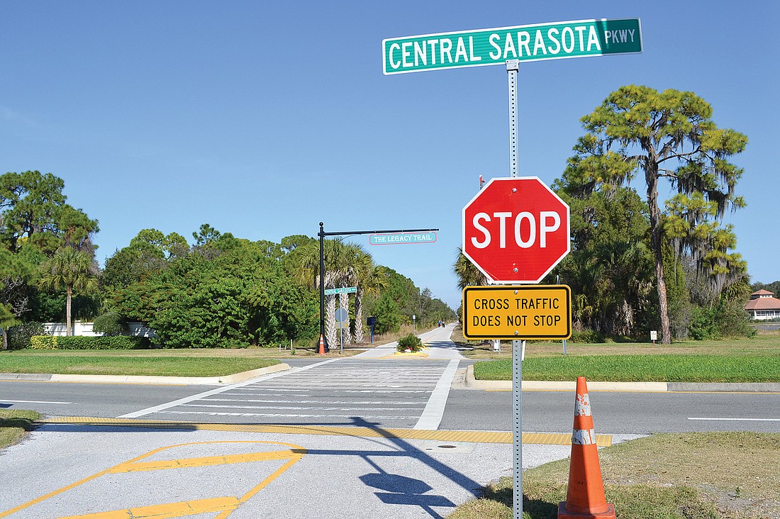 Bicyclists must now stop and wait for traffic to clear before crossing Central Sarasota Parkway on The Legacy Trail.