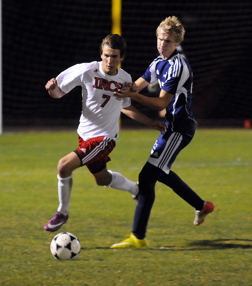 Indian Rocks Christian Schoolâ€™s Jhett Urie and ODAâ€™s Tom Young race toward the ball.