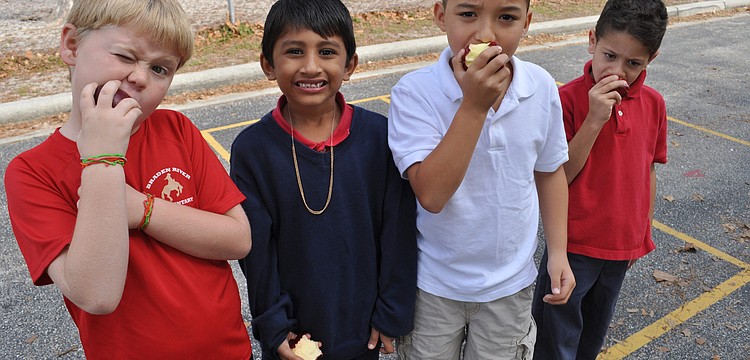 Tristen Woods, Dev Patel, Jayden Vilayvong and Alex Schroeder enjoyed a healthy snack in between activities.