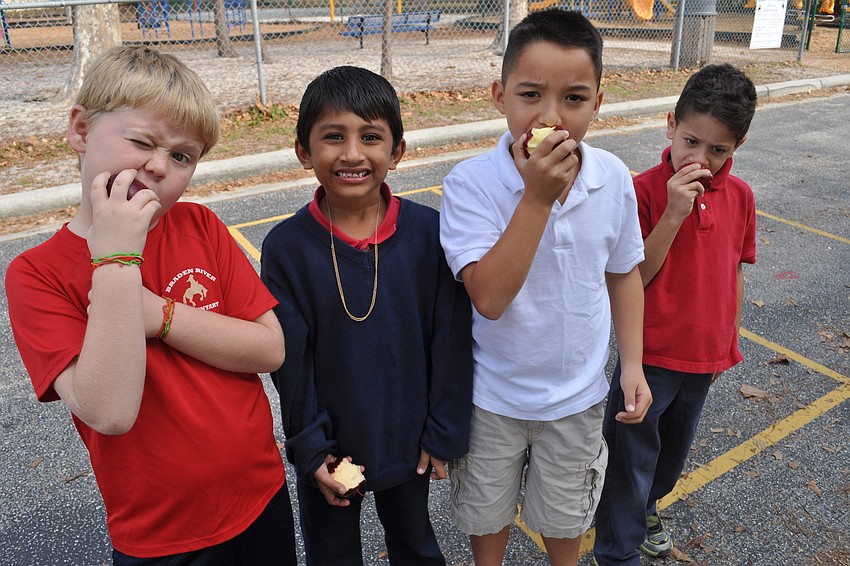 Tristen Woods, Dev Patel, Jayden Vilayvong and Alex Schroeder enjoyed a healthy snack in between activities.