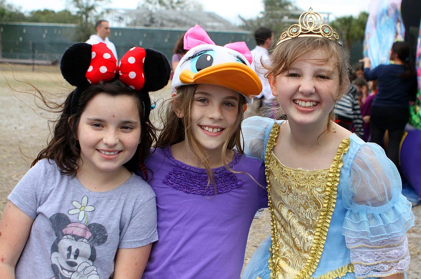 Lily Dougherty, 10, Lisa Larson, 9, and Madeleine Cooper, 10