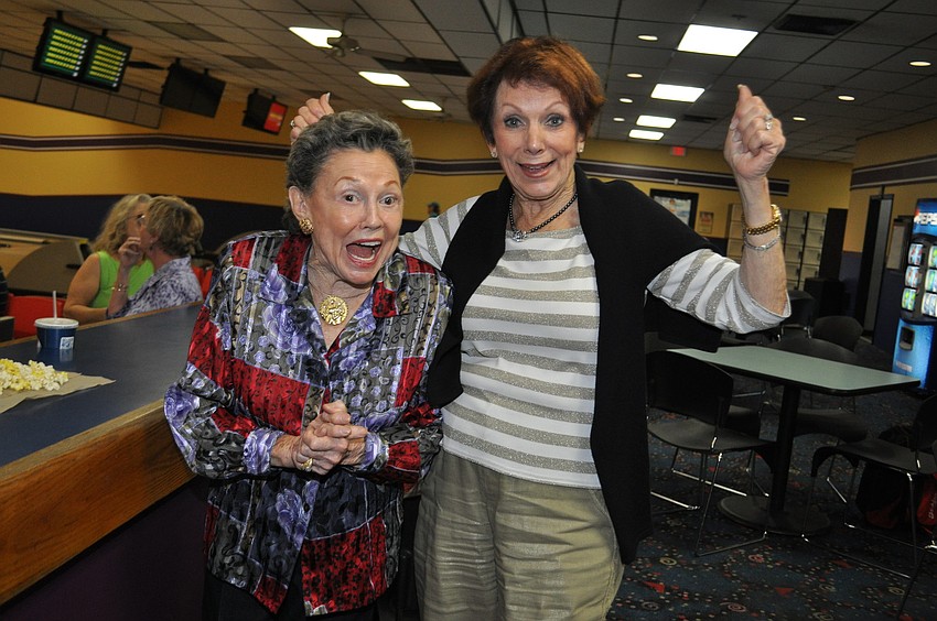 Geri Fisherkeller and Trude Smith cheer on their husbands