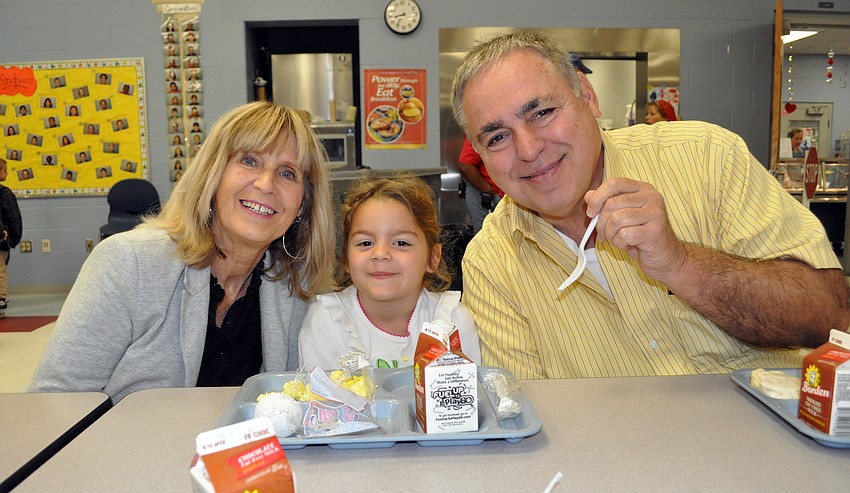 Kindergartner Grace Bondurant couldnâ€™t wait to spend the morning with her grandparents Margie and Chuck Minao.