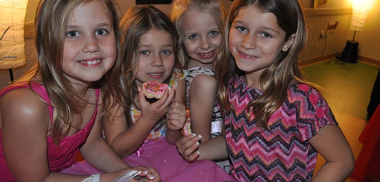 Christian Mark, Danielle and Ryann Vogel and Skylar Cox couldn't resist a sweet treat.