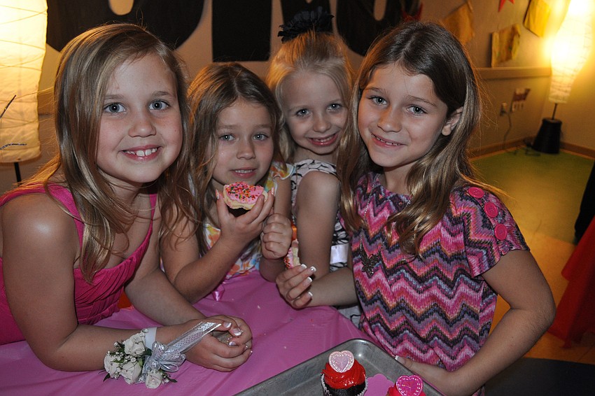 Christian Mark, Danielle and Ryann Vogel and Skylar Cox couldn't resist a sweet treat.