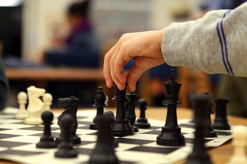 Noah Calcorzi moves his queen.