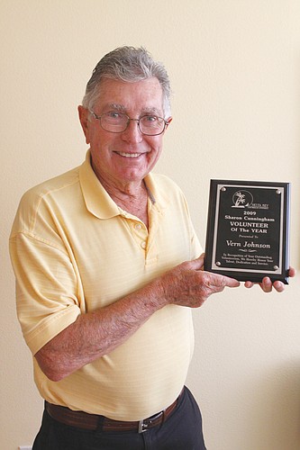 At age 80, Vern Johnson still says he has no plans to stop volunteering his time to the Siesta Key Chamber of Commerce.