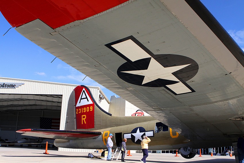 Underneath one of the wings on the 