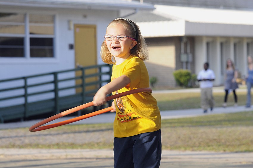 Kindergartner Katherine Prince couldnâ€™t wait to show off her hula-hooping skills.