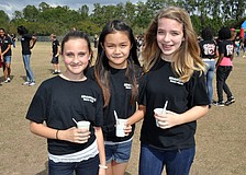 Sixth-graders Sydney Blocker, Vivian Lu and Tali Leckie made sure to get their free Icees.
