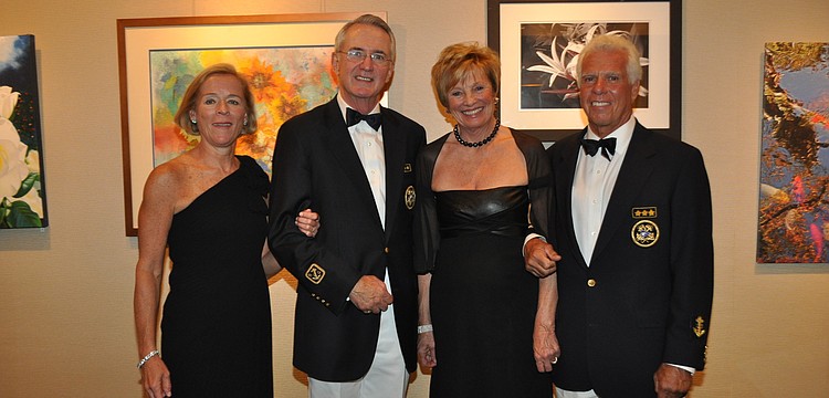 Marie and Incoming Commodore Bob Hunter and Carlene and outgoing Commodore Bob Baime