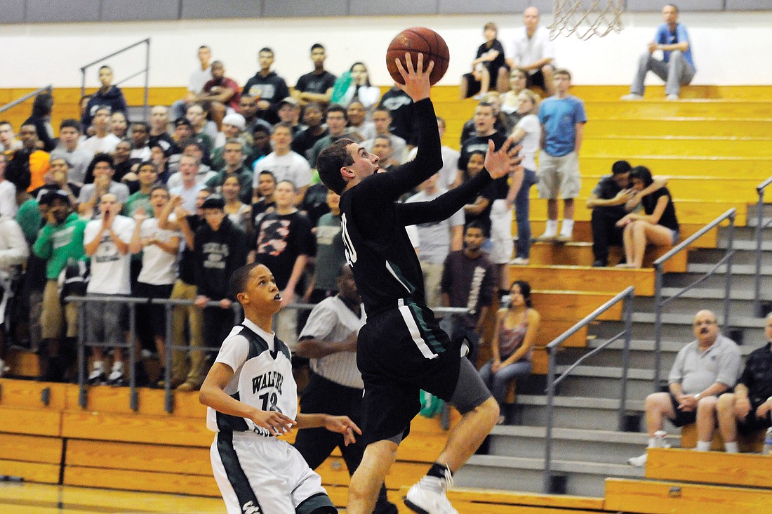 Sophomore Justin Otis scored seven points for Lakewood Ranch, including the teamÃ¢â‚¬â„¢s final two buckets. Photos by Jen Blanco.