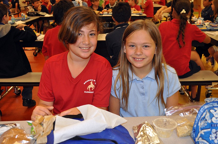 Fourth-graders Leianna Shepard and Taylor Ferber had fun dancing to the rock and roll music.