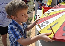 Nicholas Ortega, 4, spun the wheel for a prize.