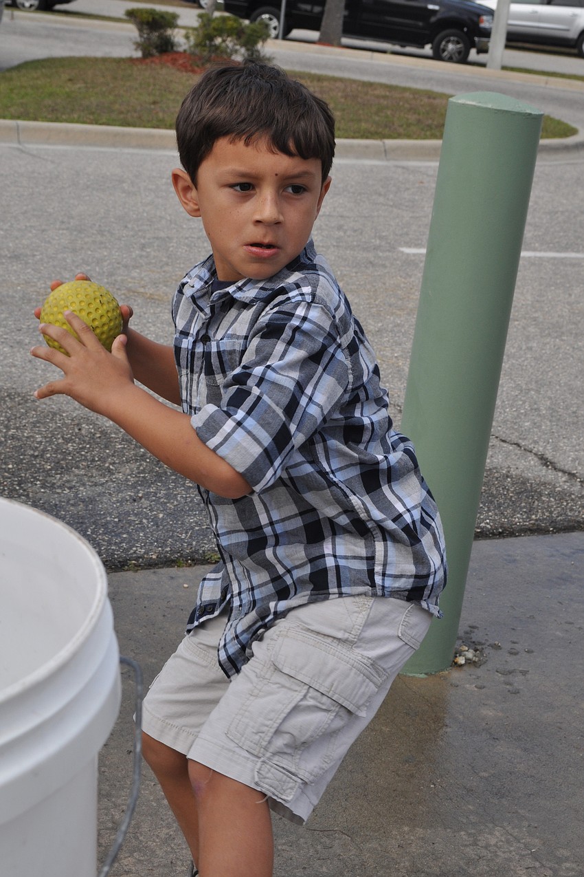 Lucas Viera, 7, tested his aim at the dunk tank.