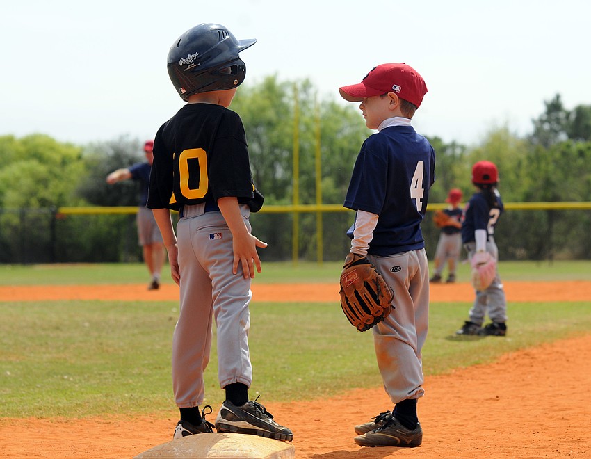 Six-year-old Jake Schmidt and 5-year-old Zack Groth were excited to get the season underway.